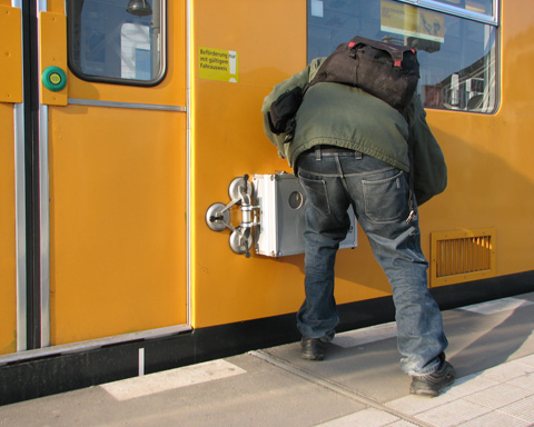 Image of the attachment of Parasite to a subway train, from the artists’ web site (http://www.digital.udk-berlin.de/de/projects/summer05/main/freeproject/trains.html#parasite)